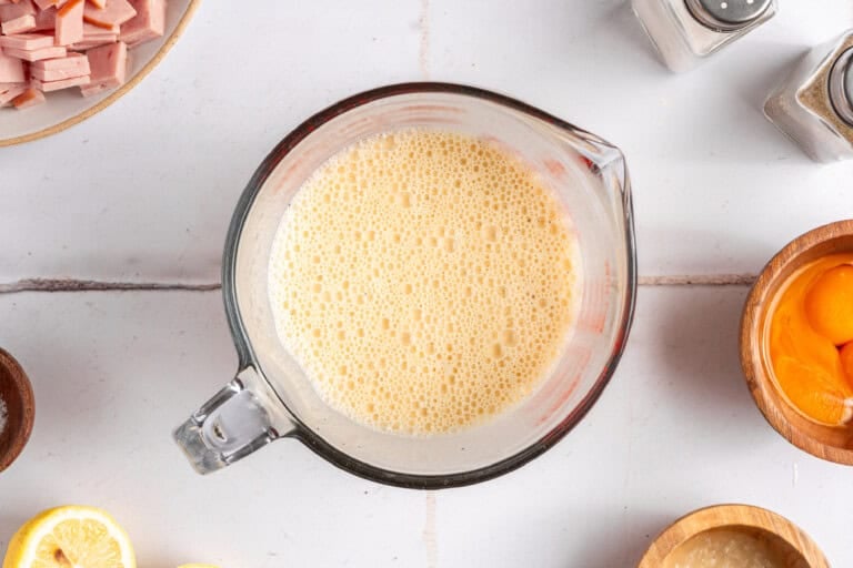 Frothy mixed egg mixture for making quiche.