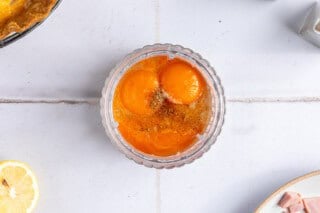 Eggs and seasoning in a blender.