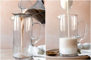 Straining horchata mixture into a glass pitcher.