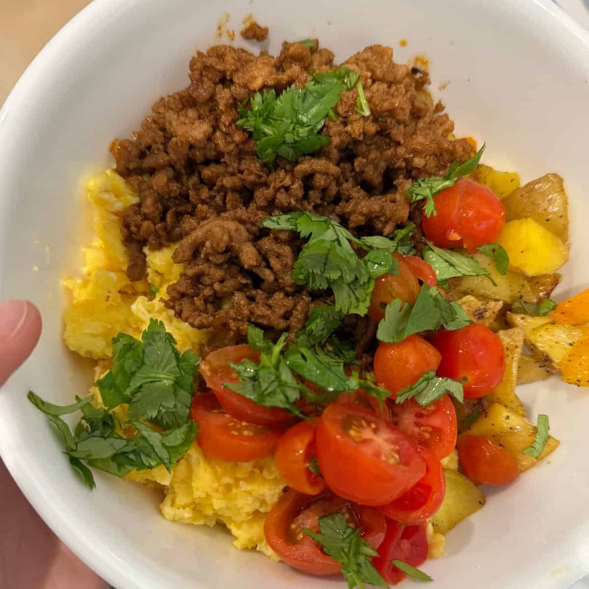 Mexican breakfast bowls with fresh cilantro. 