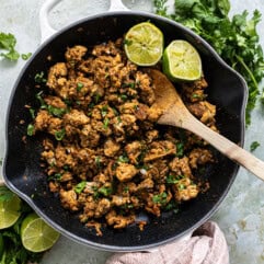 Skillet with ground cilantro lime chicken.