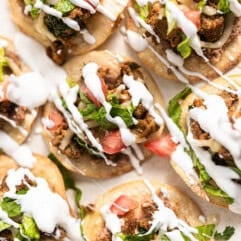 Sheet pan tostadas with a drizzle of crema.
