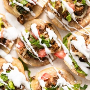 Sheet pan tostadas with a drizzle of crema.