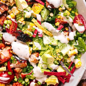 BBQ Chicken Salad drizzled with ranch dressing.