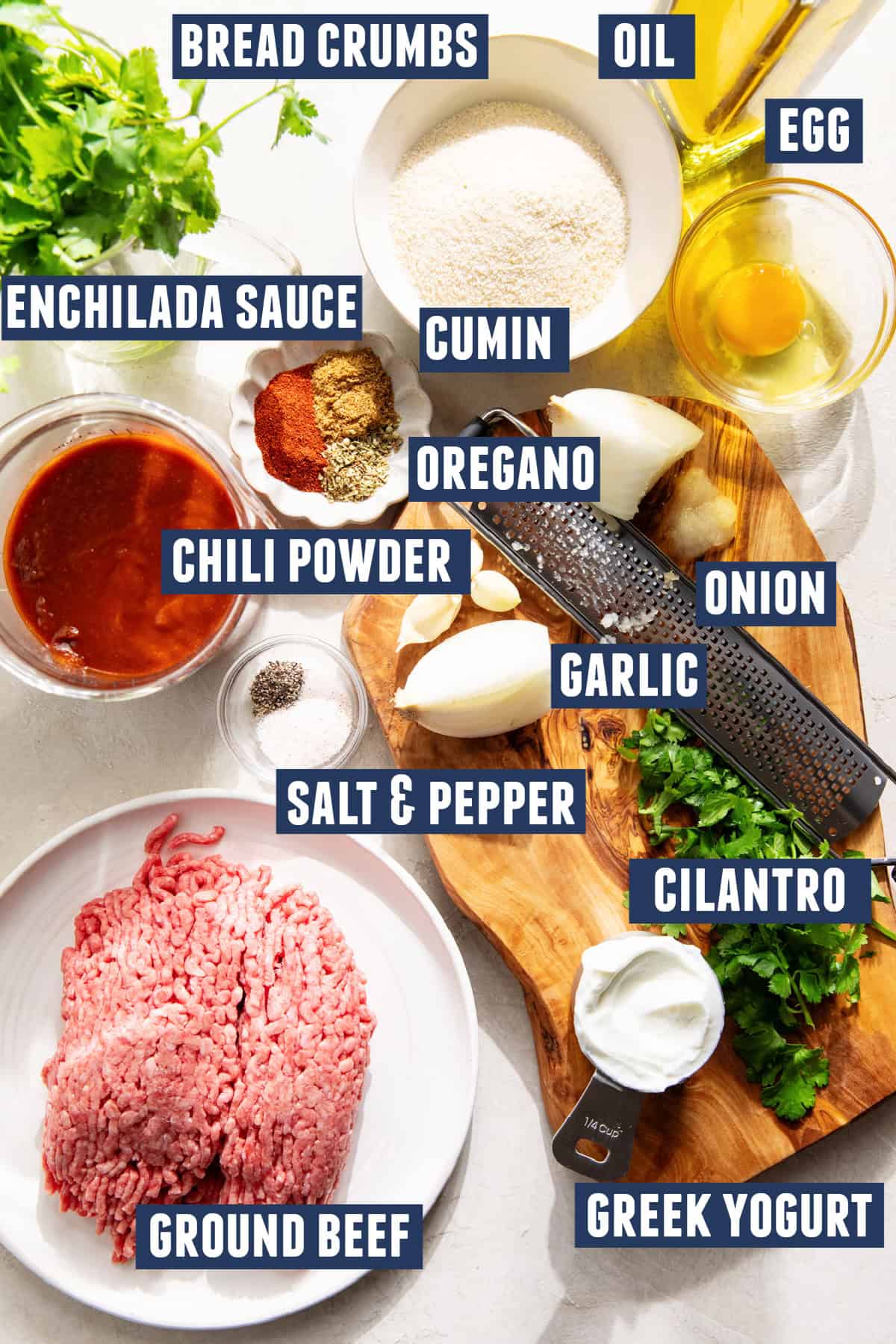 Ingredients needed to make enchilada meatballs laid out on the counter. 