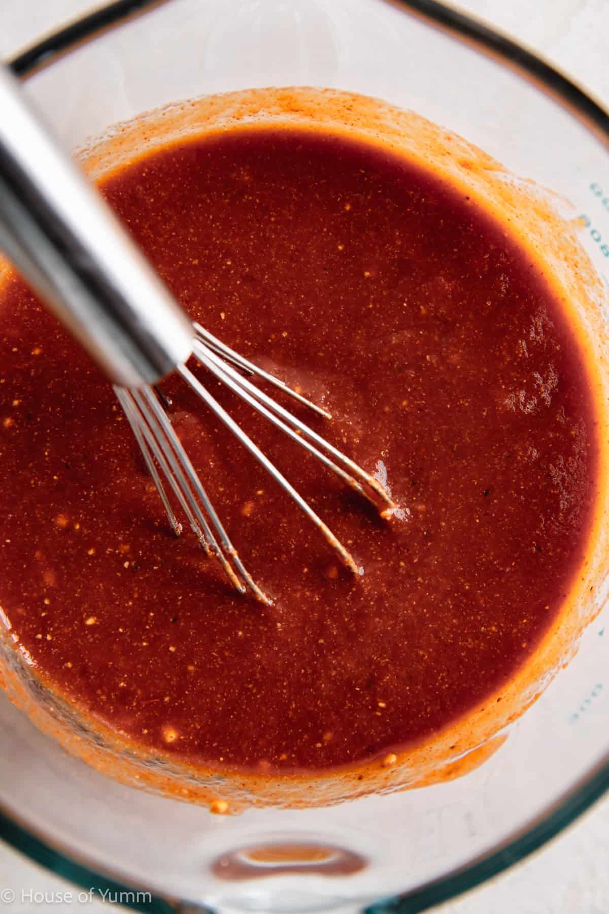 BBQ sauce in a measuring cup after whisking together.