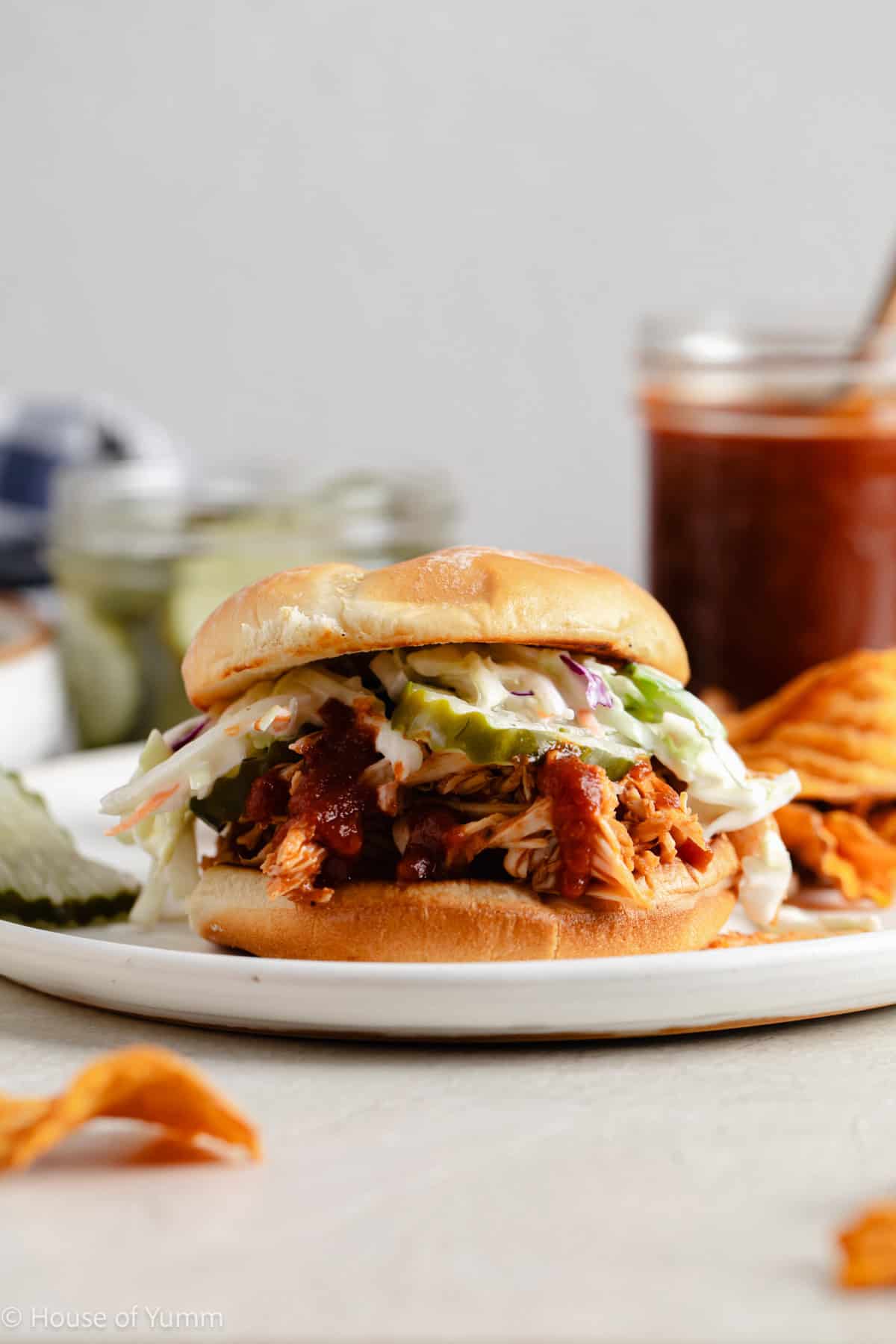 BBQ Chicken sandwich with pickles and coleslaw.