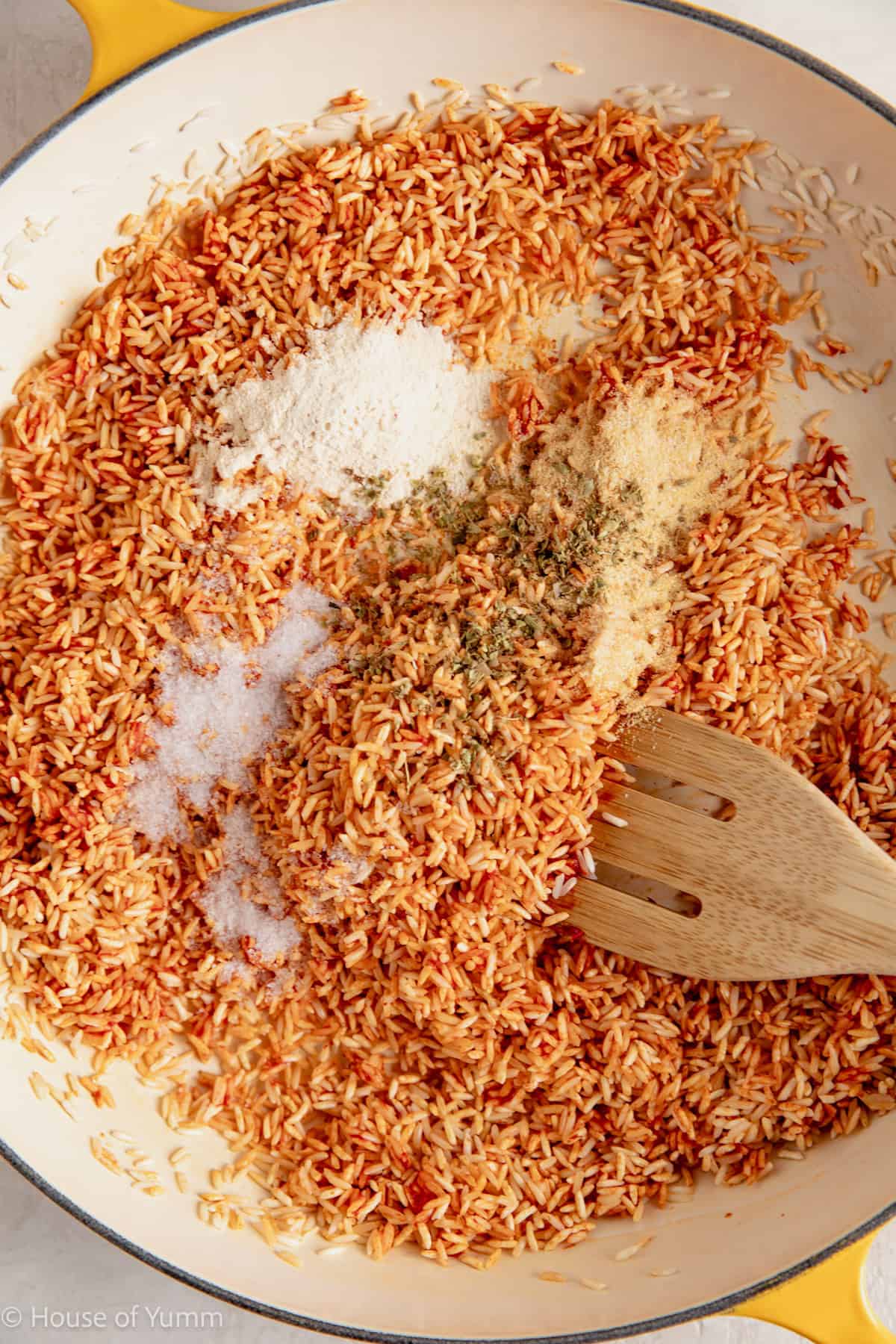 Seasonings added to rice for making Mexican rice.