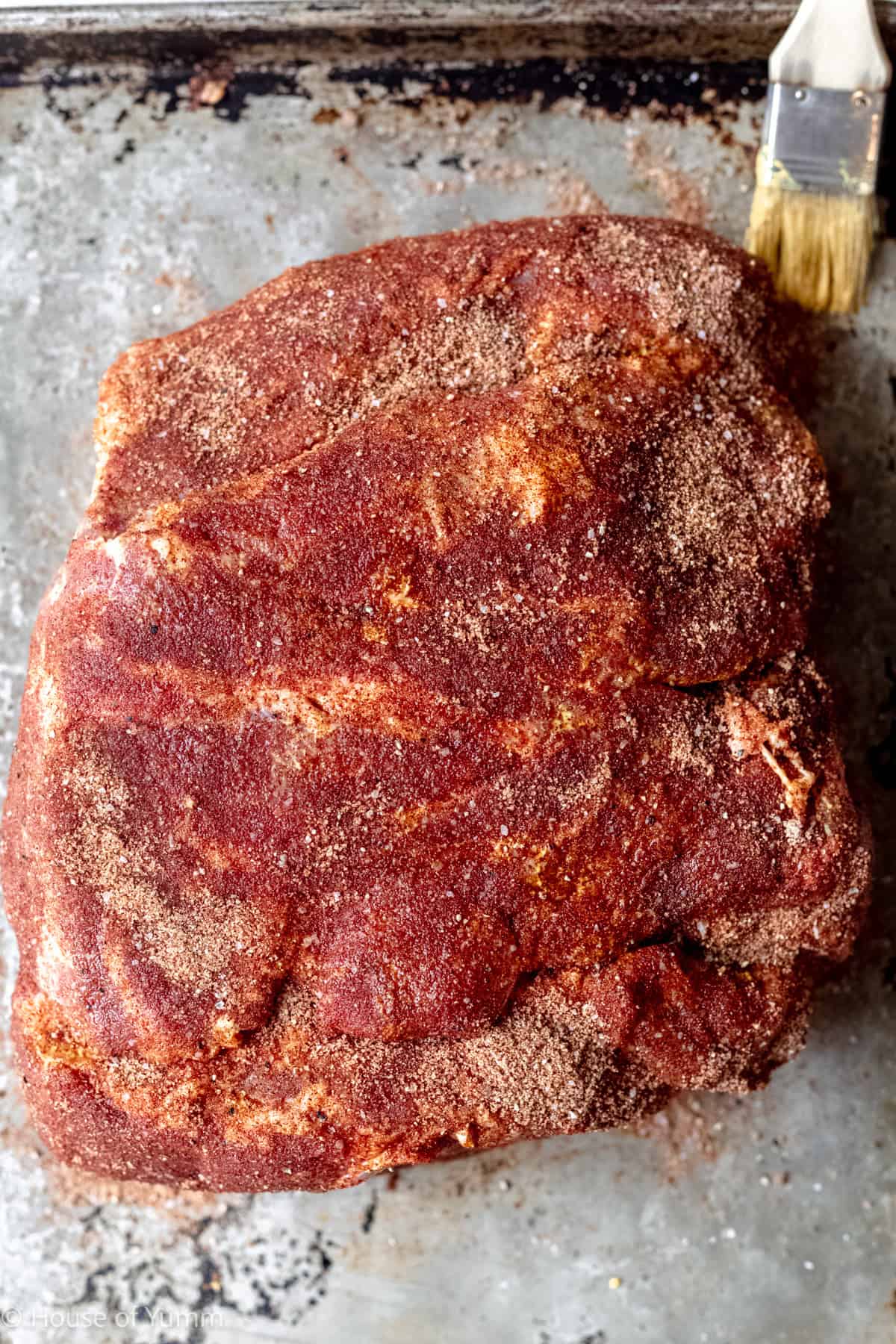Pork butter with dry rub before smoking.